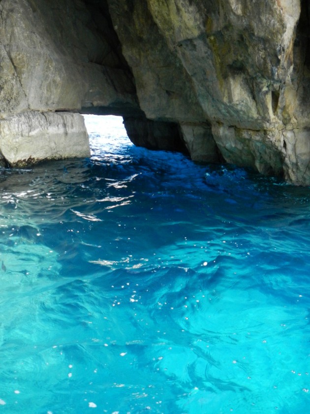 The phosphorescent waters of the Blue Grotto.