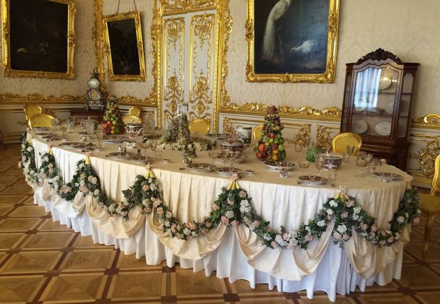 Set table in the dining room of St Catherine's Palace. Note the exquisite floor detail.